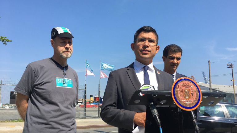 Brooklyn  City  Councilman Carlos Menchaca outlines his transit proposals for Red Hook and Sunset Park alongside Eric McClure, executive director of StreetsPAC,  and Manhattan City Councilman Ydanis Rodriguez  on Thursday.