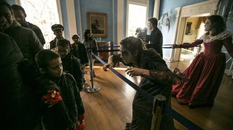 Mayor Bill de Blasio and his wife, Chirlane McCray, will host a Halloween party for New York City residents for the third consecutive year. Above, actors from the New York Film Academy's Musical Theater program haunt Gracie Mansion on Oct. 31, 2015.