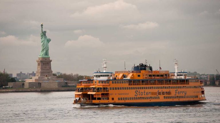 Isaiah John and Marcus Temple were charged in the beating and slashing of a man on the Staten Island Ferry, authorities said.