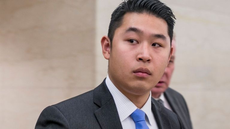 
NYPD Officer Peter Liang enters the courtroom in Supreme Court in Brooklyn on Jan. 28, 2016. Officer Liang is on trial for the 2014 shooting of Akai Gurley in a Brooklyn public housing stairwell.