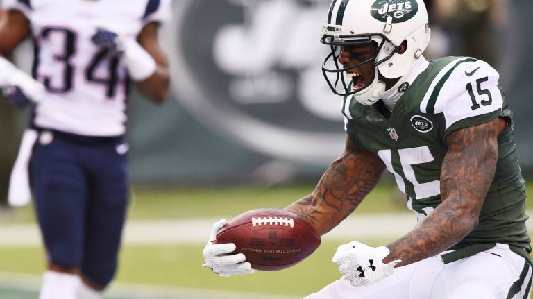 Jets receiver Brandon Marshall makes a catch and scores a touchdown against the Patriots 
on Sunday, Dec. 27, 2015 at MetLife Stadium in East Rutherford, N.J.