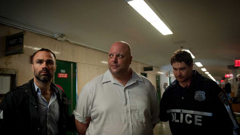 Carmine Vitolo, a manager at the RoadHouse NYC Gentlemen's club, arrives for arraignment at Manhattan Supreme Court on June 11, 2014. 