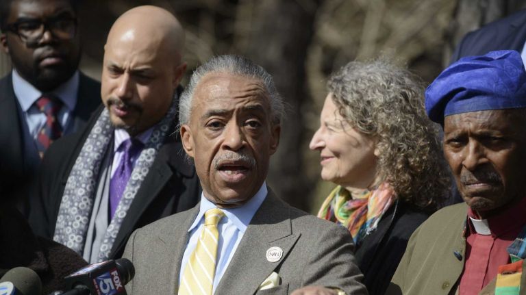 'Shop and frisk' solutions discussed by Sharpton, Bratton 1 Al Sharpton, center, and members of the