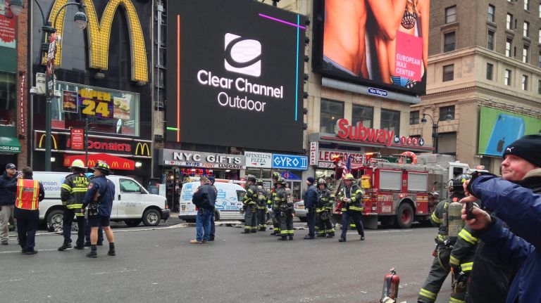 A manhole fire near Penn Station Wednesday afternoon caused two buildings and two trains to evacuate.