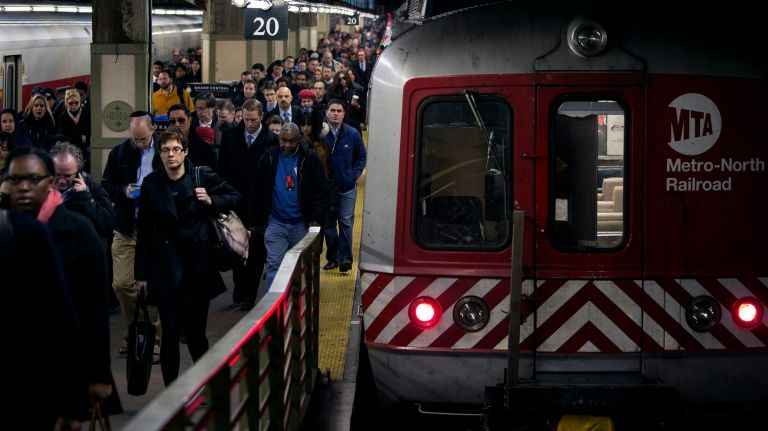 Metro-North passengers disembark at Grand Central Terminal.