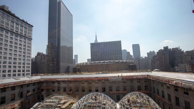 Penn Station proposal includes new 33rd Street entrance, pedestrian plaza 2 The Moynihan Train Hall construction project, shown Thursday, is on pace for a 2020 opening.