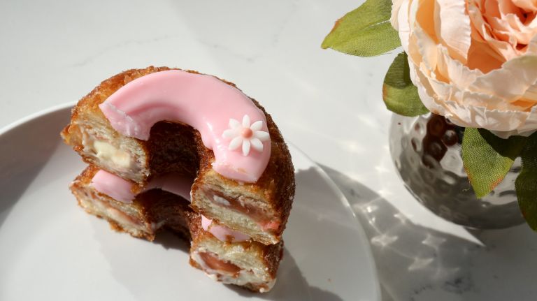 Last month's Cronut features a mascarpone ganache and rhubarb rose fondant.