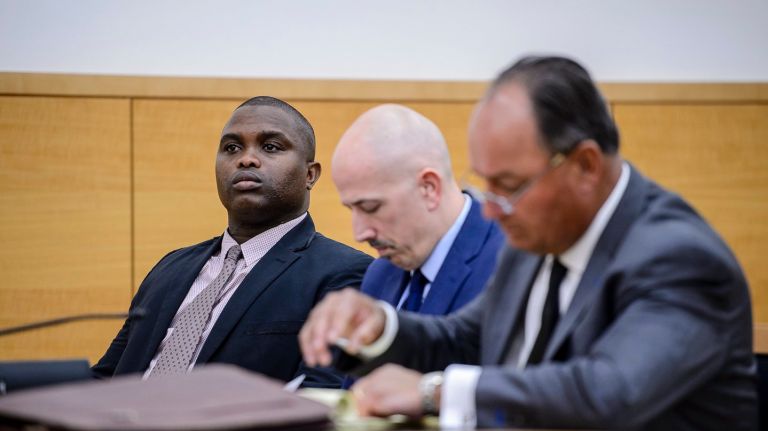 NYPD Officer Wayne Isaacs said he was hit by  Delrawn Small  before fatally shooting him  on a Brooklyn street on July 4, 2016, the responding officers testified in court on Tuesday, June 13, 2017. Isaacs, above left, is charged  with second-degree murder and manslaughter.