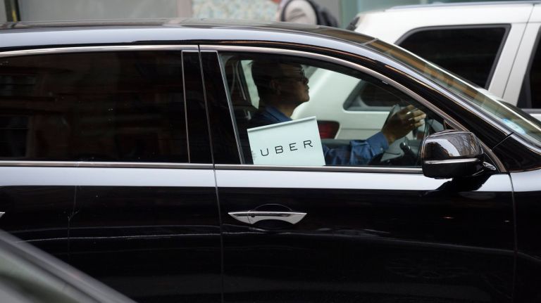 Opponents to Uber's labor practices are pushing for New York state to classify drivers as employees rather than independent contractors.