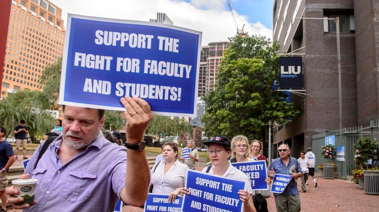 Long Island University faculty protest the school's lockout of union faculty  outside the  college's Flatbush Avenue entrance  in Downtown Brooklyn  on Wednesday, Sept. 7, 2016.