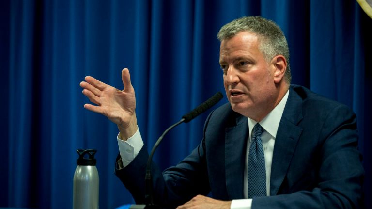 Mayor Bill de Blasio talks to the press at 105th Precinct in Queens Village, on May 3, 2016.