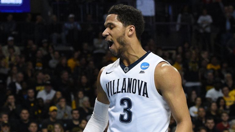 Villanova Wildcats guard Josh Hart reacts after he sinks a shot against the Iowa Hawkeyes during a second-round men's college basketball game in the NCAA Tournament at Barclays Center on Sunday, March 20, 2016. 