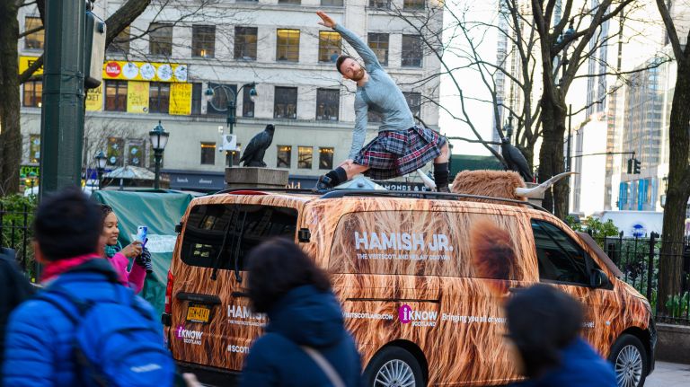 NYC Tartan Week kicked off on Monday with kilted yoga expert Finlay Thomas Wilson atop VistScotland's official Coo Van. The week celebrates all things Scottish with a parade, dancing, whisky tastings and much more.