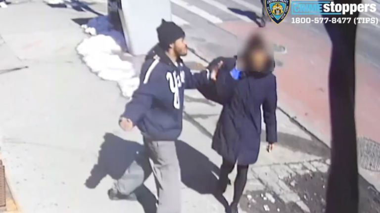 The NYPD is looking for a man who punched a woman in the head on the street in Crown Heights on March 9.