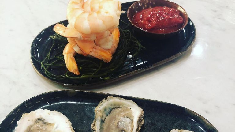 The Meatpackers American Brasserie, a new restaurant from chef&nbsp;Richard Farnabe, offers $2.50 oyster bar options.&nbsp;