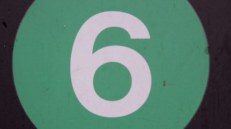 Police said a woman was hit in the head with a rubber mallet while getting on the No. 6 train on the Upper East Side on June 15, 2016.