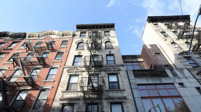 Residential buildings  in the East Village  along East  1st Street between First  and Second  avenues.
