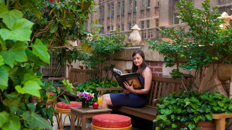 The Library Hotel offers an outdoor terrace filled with plants, a writer's den and a poetry garden.&nbsp;