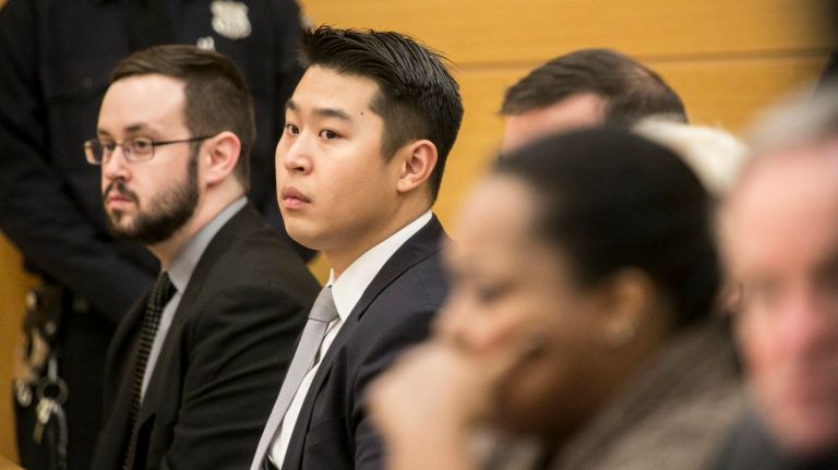 
NYPD Officer Peter Liang sits in Brooklyn Supreme Court as evidence is reviewed by the jury in his manslaughter case on Feb. 10, 2015. Officer Liang is on trial for the 2014 shooting of Akai Gurley in a Brooklyn public housing stairwell.