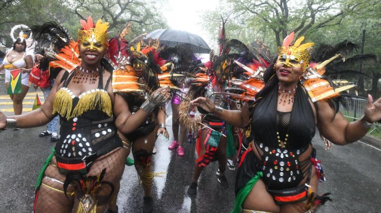 Performers dance in the West Indian American Day Parade in Crown Heights on Monday.