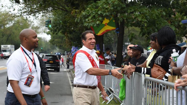 Gov. Andrew M. Cuomo greets spectators at the West Indian American Day Parade in Crown Heights on Monday.
