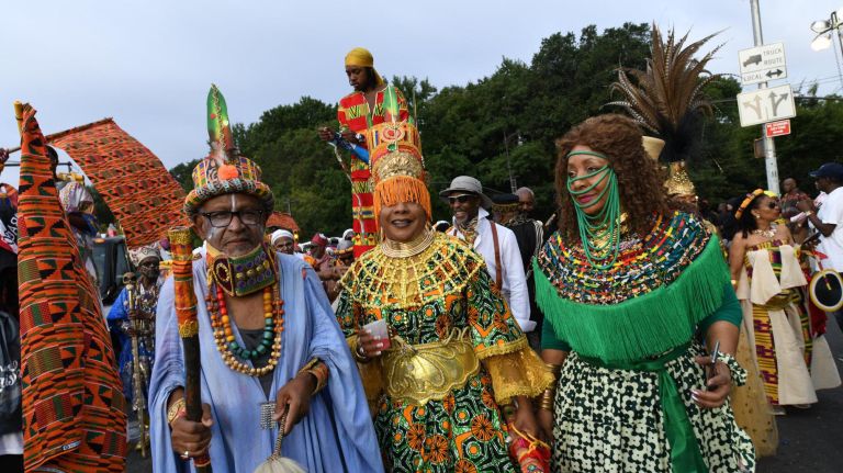 J'Ouvert festival participants gather on Empire Boulevard in Crown Heights for the annual celebration Monday.