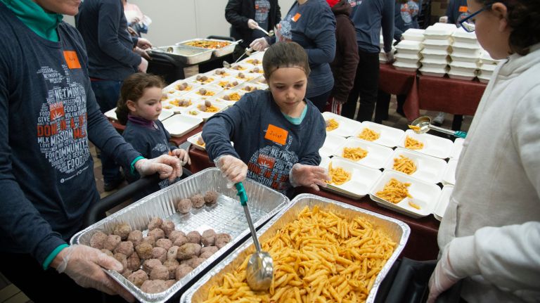 NYC marks Martin Luther King Jr. Day with community service projects 1 Volunteers at the Food Bank for New York City help prepare 1,500 meals during the annual day of service on Martin Luther King Jr. Day on Monday.