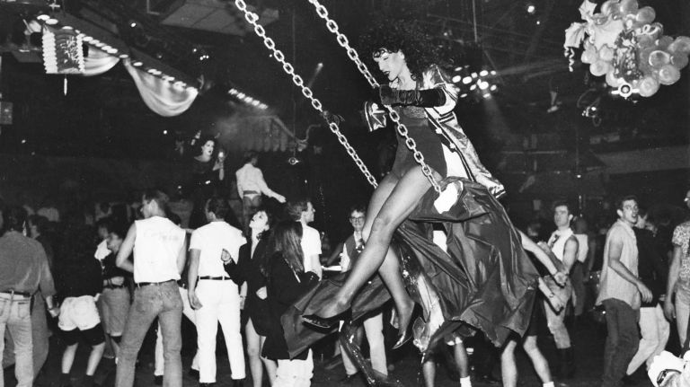Rare images of NYC nightclubs from the 1980s and '90s, including the Limelight and Roxy 51 A club-goer on a swing sails over heads on May 19, 1990, at the famed Roxy club, which was once called