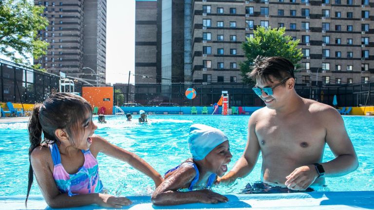 13 of NYC's best public pools: Cool off in all five boroughs 16 Mapes Ballfield has a spacious pool at 75 feet in length and also has a wading pool for the kiddies. It was recently re-painted with an ice cream/summer/beach theme and has chairs and tables available. Pictured, NYC Parks Citywide Aquatics instructor Jeabenjamin Gonzales of East Harlem teaches Leilani Lucre-Valentin, 6, and Skhye Gant, 6, both of the Bronx, how to make bubbles underwater. (East 180th Street, between Mapes and Prospect avenues in East Tremont)