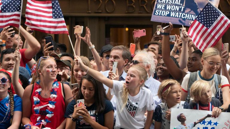 World Cup parade: Photos from the celebration for the U.S. women's soccer team 20 Fans cheer as the players make their way up Broadway's Canyon of Heroes during the ticker-tape parade.