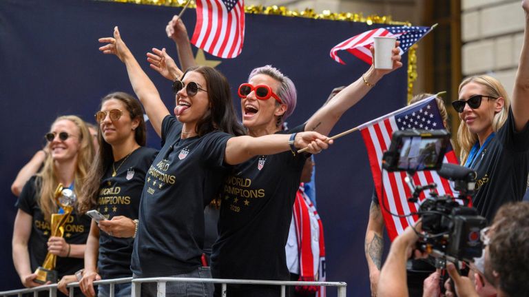 World Cup parade: Photos from the celebration for the U.S. women's soccer team 22 U.S. Women's National Team members Alex Morgan, left, and Megan Rapinoe wave to the crowd as the parade heads up Broadway.