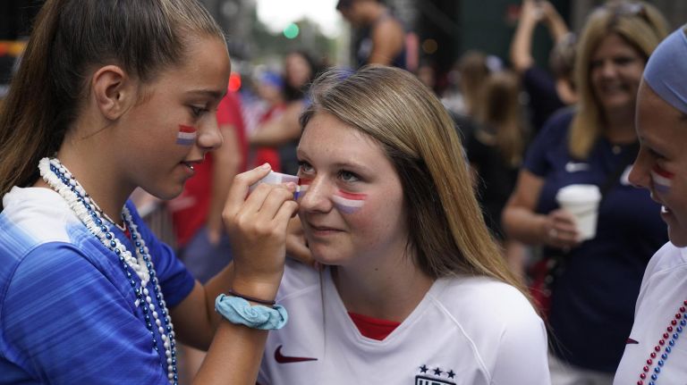 World Cup parade: Photos from the celebration for the U.S. women's soccer team 30 Boston resident Caitlyn Tucker has American flag makeup applied to her face at U.S. Women's Soccer Team Ticker-Tape Parade - July 10, 2019 - Manhattan, NY..