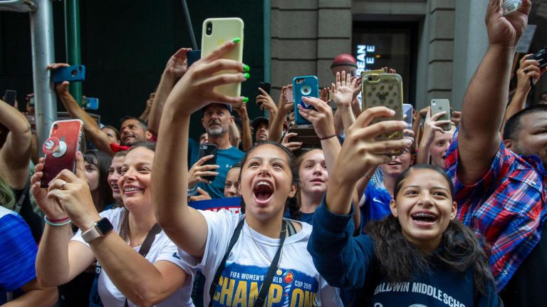World Cup parade: Photos from the celebration for the U.S. women's soccer team 31 Fans take pictures and cheer on the World Cup winners.