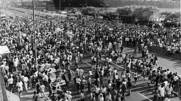 An overview of the crowd at the rally on Christopher and West streets at the end of the NYC Pride March on June 28, 1987.