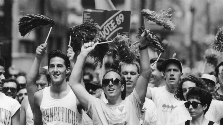 Gay rights activists representing the Lesbian and Gay Community Services Center dance down Fifth Avenue on June 25, 1989.