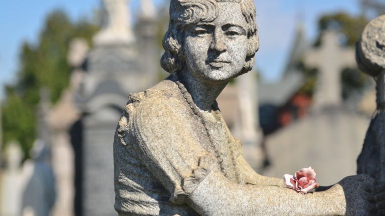 Monument at Calvary Cemetery to a 25-year-old woman named Rose.