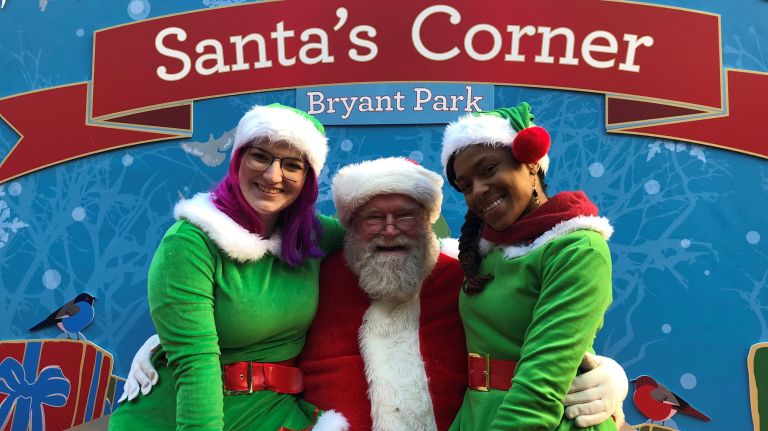Meet Bryant Park's Santa Claus, a Nobel Peace Prize winner 1 Santa, aka Dr. Charles Nuttall, poses in Bryant Park with some elves.