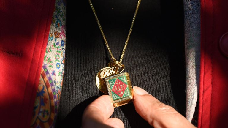 'Iftar in the City' celebrates Ramadan in the Bronx 35 The city hosted the 4th annual ÒIftar in the CityÓ on St. Raymond Avenue in the Bronx . The event had nearly a thousand community members of all faiths to celebrate Ramadan with a fast-breaking meal at sundown. A woman holds a piece of jewelry, a miniature Koran around her neck.