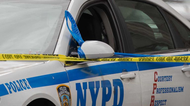 Two infants were found dead inside their father's car on Friday, police said.