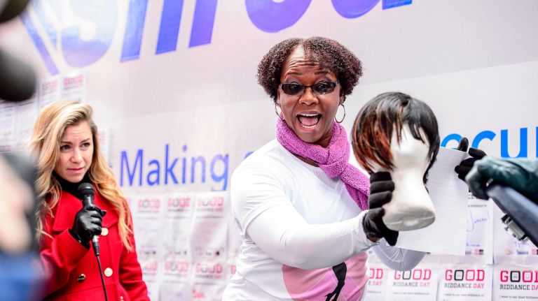Arlene Roberts came to Times Square to shred her wig after surviving breast cancer at Good Riddance Day 2016.