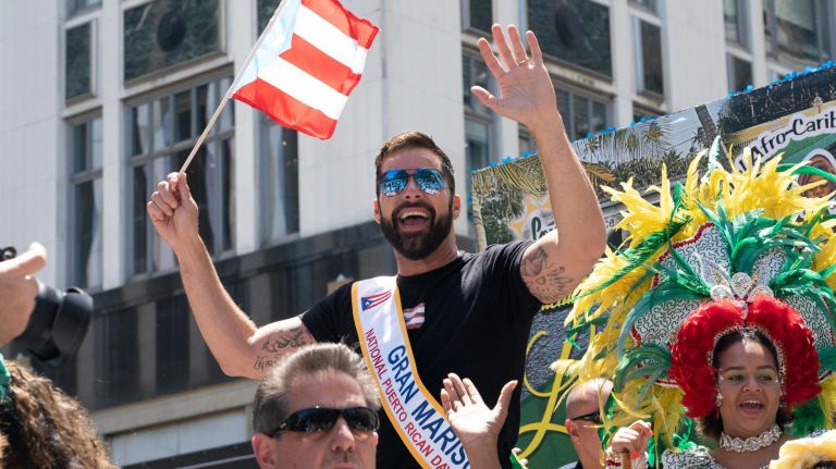 Grand Marshall Ricky Martin waves to spectators lining 5th Avenue in Manhattan during the 2019 Puerto Rican Day Parade, Sunday, June 9, 2019. The parade is in its 62nd year and is celebrating the creativity and diversity of thought in Puerto Rico and across the diaspora, according to the parade organizers.