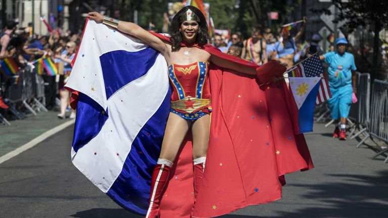 Wonder Woman strikes a pose during the NYC Pride March along Fifth Avenue on June 26, 2016.