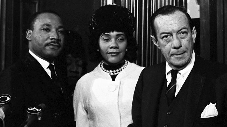 Dr. Martin Luther King, Jr. poses at City Hall with his wife Coretta Scott King and New York City Mayor Robert F. Wagner on Dec. 17, 1964. Wagner had given King a medallion declaring him an honorary New Yorker.