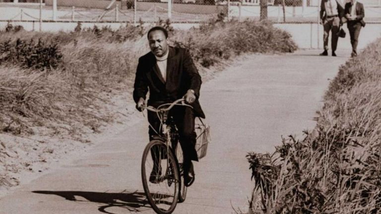 The Rev. Martin Luther King Jr. rides a bicycle on Fire Island on Sept. 2, 1967.