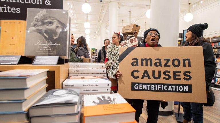 Protesters rally against Amazon inside the retailer's bookstore on West 34th Street on Monday.