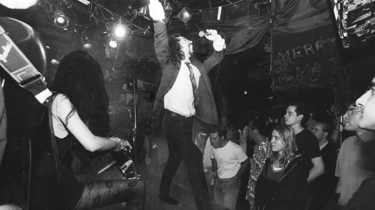 Rare images of NYC nightclubs from the 1980s and '90s, including the Limelight and Roxy 59 Dave Ouinet, lead singer of the rock group Motherhead Bug, belts out a tune at CBGB on Aug. 13, 1992. The club opened in the East Village at 315 Bowery in 1973 and shut its doors in 2006.