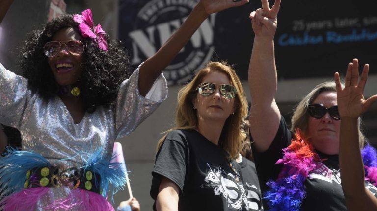 NYC Pride March 2016: See photos of the annual march to commemorate the Stonewall riots 90 Barbara Poma, center, the owner of Orlando's Pulse nightclub, rides on a float during the 2016 New York City Pride March on Fifth Avenue in Manhattan on Sunday, June 26, 2016. This year's Pride parade pays tribute to the 49 killed in the shooting at Pulse, a gay nightclub, two weeks ago on June 12.