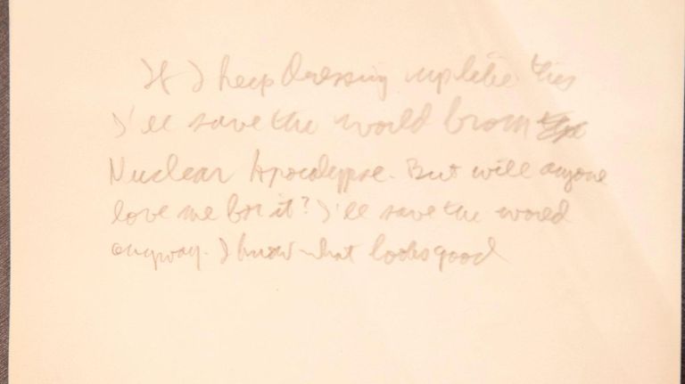 A handwritten note from Allen Ginsburg,&nbsp;mentioning "nuclear apocalypse," is written on the back of a photo from 1977.