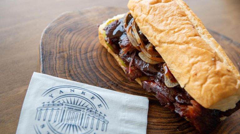 Keep the wet wipes handy for Mighty Quinn's new rib options, smothered in sauces and packed between buns. The 