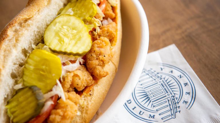 A new crispy maple chicken sandwich joins the stadium's own Legend's menu offerings, along with shrimp po' boy (pictured) and roast beef po' boy sandwiches and an elevated version of the classic burger topped with fresh burrata, pancetta, tomato relish and baby arugula. Where: Batter's Eye Deck 